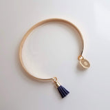 Gold Cuff Bracelet, initial bracelet, gold letter bracelet, gold tassel bracelet, thin gold cuff, navy blue tassel cuff, letter charm bangle - Constant Baubling