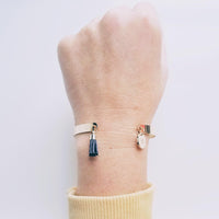 Gold Cuff Bracelet, initial bracelet, gold letter bracelet, gold tassel bracelet, thin gold cuff, navy blue tassel cuff, letter charm bangle - Constant Baubling