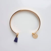 Gold Cuff Bracelet, initial bracelet, gold letter bracelet, gold tassel bracelet, thin gold cuff, navy blue tassel cuff, letter charm bangle - Constant Baubling
