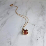 Red Sandstone Necklace, stone ball pendant, sparkling stone necklace, gold chain, brown stone necklace, spinning ball pendant, glitter stone - Constant Baubling