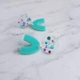 Clear Confetti Earrings, aqua blue dangle arch, metallic purple polka dot earring, chunky earring, 80s earring, 80s style, vintage style - Constant Baubling
