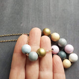 Wood Bead Necklace, painted wood beads, soft color bead necklace, gold, white, pink, grey, natural wood, long gold chain, color block balls - Constant Baubling
