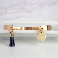 Gold Cuff Bracelet, initial bracelet, gold letter bracelet, gold tassel bracelet, thin gold cuff, navy blue tassel cuff, letter charm bangle - Constant Baubling