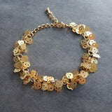 Skull Bracelet, matte gold bracelet, tiny gold skulls, small gold skull bracelet, skull fringe, gold skull chain, skeleton face bracelet - Constant Baubling