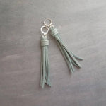 Blue Grey Tassel Earrings, faux suede tassel, vegan leather tassel, long blue tassel, silver huggie hoop, round lever back, boho earrings - Constant Baubling