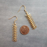 Gold Arrow Earrings, modern earring, chevron earring, fishbone earring, spine earring, vertebrae earring, feather earring, long gold dangle - Constant Baubling