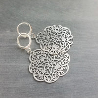 Silver Medallion Earrings, Morrocan earring, silver lacy earring, silver filigree earring, floral earring, cut out design, snap huggie hoop - Constant Baubling