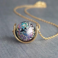 Moon Necklace, metallic stone pendant, lava stone necklace, iridescent rainbow, gold half circle eclipse, pitted stone crater, jewel peacock - Constant Baubling