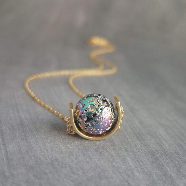 Moon Necklace, metallic stone pendant, lava stone necklace, iridescent rainbow, gold half circle eclipse, pitted stone crater, jewel peacock - Constant Baubling