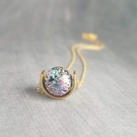 Moon Necklace, metallic stone pendant, lava stone necklace, iridescent rainbow, gold half circle eclipse, pitted stone crater, jewel peacock - Constant Baubling