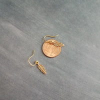 Tiny Gold Feather Earrings, small feather earring, tiny feather earring, gold feather charm, little feather dangle, simple gold feather - Constant Baubling