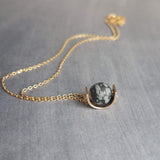 Matte Black Stone Necklace, eclipse necklace, snowflake obsidian necklace, spotted obsidian pendant, gold semicircle, modern half circle orb - Constant Baubling
