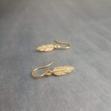 Tiny Gold Feather Earrings, small feather earring, tiny feather earring, gold feather charm, little feather dangle, simple gold feather - Constant Baubling