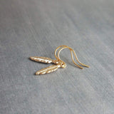 Tiny Gold Feather Earrings, small feather earring, tiny feather earring, gold feather charm, little feather dangle, simple gold feather - Constant Baubling