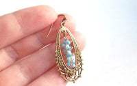 Long Oval Earrings - elongated lacy filigree in antique brass/bronze with tiny blue bead cluster center - fancy decorative boho - Constant Baubling