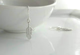 Silver Feather Earrings, tiny rhodium feather earring, small silver feather, matte rhodium feather, matte silver feather, little dangle hook - Constant Baubling